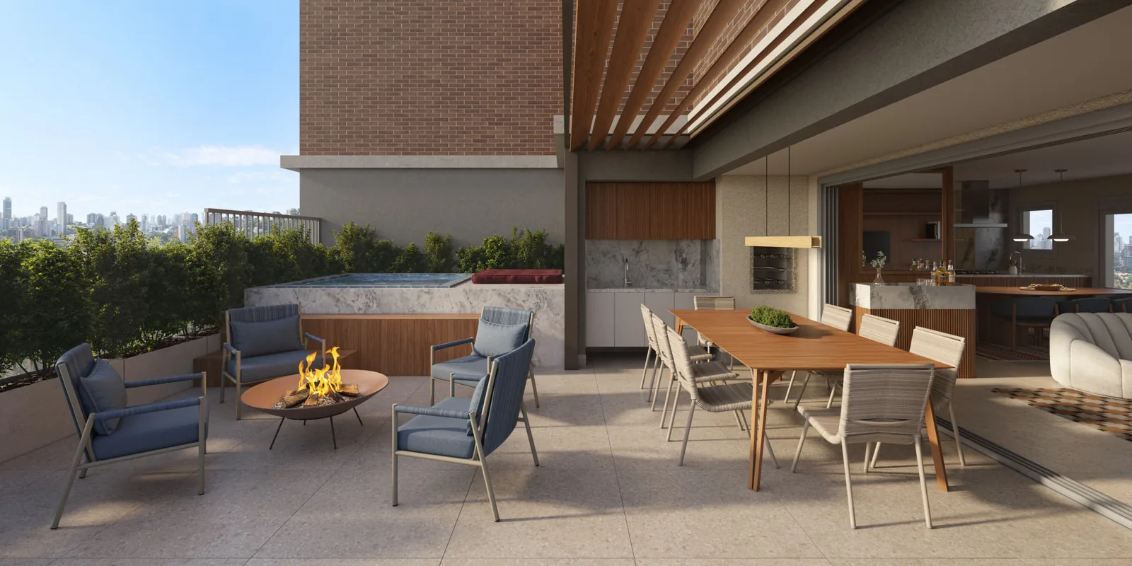 Terraço da cobertura com lareira externa, mesa de jantar e spa embutido